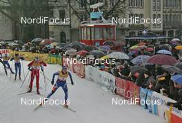 20.12.2008, Duesseldorf, Germany (GER): feature, spectators with umbrellas in the rain, in front Natalja Naryshkina (RUS) - FIS world cup cross-country, individual sprint, Duesseldorf. www.nordicfocus.com. © Hemmersbach/NordicFocus. Every downloaded picture is fee-liable.