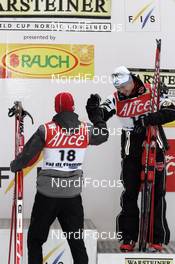 12.01.2008, Val di Fiemme, Italy (ITA):l-r: Bill Demong (USA), Sebastian Haseney (GER)  - FIS world cup nordic combined, individual gundersen, Val di Fiemme (ITA). www.nordicfocus.com. c Felgenhauer/NordicFocus. Every downloaded picture is fee-liable.