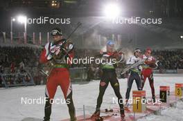 08.01.2009, Oberhof, Germany (GER): Daniel Mesotitsch (AUT), Fischer, Rottefella, Leki, Michael Greis (GER), Madshus, Rottefella, Exel, adidas, Christian de Lorenzi (ITA), Fischer, Rottefella, Alpina, Leki, Emil Hegle Svendsen (NOR), Madshus, Rottefella, Swix, Odlo - IBU world cup biathlon, relay men, Oberhof (GER). www.nordicfocus.com. © Manzoni/NordicFocus. Every downloaded picture is fee-liable.