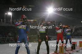 08.01.2009, Oberhof, Germany (GER): l-r: Dmitri Iarochenko (RUS), Madshus, Rottefella, Swix, adidas, Arnd Peiffer (GER), Fischer, Salomon, adidas, Dominik Landertinger (AUT), Fischer, Rottefella, Leki - IBU world cup biathlon, relay men, Oberhof (GER). www.nordicfocus.com. © Manzoni/NordicFocus. Every downloaded picture is fee-liable.