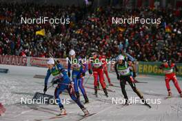 07.01.2009, Oberhof, Germany (GER): l-r: Marie Laure Brunet (FRA), Rossignol, Rottefella, Swix, Odlo, Dana Plotogea (ROU), Fischer, Salomon, Exel, Simone Hauswald (GER), Fischer, Rottefella, Exel, adidas, Toko - IBU world cup biathlon, relay women, Oberhof (GER). www.nordicfocus.com. © Manzoni/NordicFocus. Every downloaded picture is fee-liable.