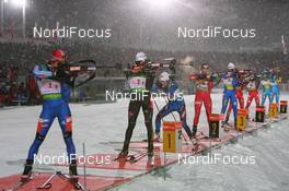 07.01.2009, Oberhof, Germany (GER): l-r: Svetlana Sleptsova (RUS), Madshus, Rottefella, Swix, adidas, Simone Hauswald (GER), Fischer, Rottefella, Exel, adidas, Toko, Marie Laure Brunet (FRA), Rossignol, Rottefella, Swix, Odlo, Krystyna Palka (POL), Fischer, Salomon - IBU world cup biathlon, relay women, Oberhof (GER). www.nordicfocus.com. © Manzoni/NordicFocus. Every downloaded picture is fee-liable.