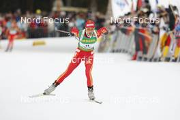 18.01.2009, Ruhpolding, Germany (GER): Xianying Liu (CHN), Fischer, Salomon, Swix, adidas - IBU world cup biathlon, pursuit women, Ruhpolding (GER). www.nordicfocus.com. © Manzoni/NordicFocus. Every downloaded picture is fee-liable.