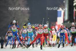 14.01.2009, Ruhpolding, Germany (GER): start of the relay with Chunli Wang (CHN), Fischer, Salomon, Swix, adidas  in front- IBU world cup biathlon, relay women, Ruhpolding (GER). www.nordicfocus.com. © Manzoni/NordicFocus. Every downloaded picture is fee-liable.