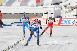 24.01.2009, Antholz, Italy (ITA): Anna Boulygina (RUS), Madshus, Rottefella, Exel, adidas wins infront of Kaisa Maekaeraeinen (FIN), Atomic, Leki, Odlo and Darya Domracheva (BLR), Fischer, Rottefella, Swix - IBU world cup biathlon, pursuit women, Antholz (ITA). www.nordicfocus.com. © Manzoni/NordicFocus. Every downloaded picture is fee-liable.