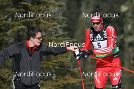 11.03.2009, Vancouver, Canada (CAN): Thomas Uhr (SUI), physio therapist Team Switzerland and Simon Hallenbarter (SUI), Madshus, Rottefella, KV+, adidas - IBU world cup biathlon, individual men, Vancouver (CAN). www.nordicfocus.com. © Manzoni/NordicFocus. Every downloaded picture is fee-liable.
