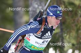11.03.2009, Vancouver, Canada (CAN): Jeremy Teela (USA), Madshus, Rottefella, Alpina, Exel, adidas - IBU world cup biathlon, individual men, Vancouver (CAN). www.nordicfocus.com. © Manzoni/NordicFocus. Every downloaded picture is fee-liable.