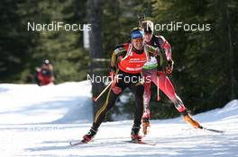 11.03.2009, Vancouver, Canada (CAN): Michael Greis (GER), Madshus, Rottefella, Exel, adidas and Robin Clegg (CAN), Rossignol, Rottefella, Leki - IBU world cup biathlon, individual men, Vancouver (CAN). www.nordicfocus.com. © Manzoni/NordicFocus. Every downloaded picture is fee-liable.