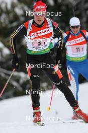 15.03.2009, Vancouver, Canada (CAN): Simon Schempp (GER), Fischer, Rottefella, Alpina, Leki, adidas  - IBU world cup biathlon, relay men, Vancouver (CAN). www.nordicfocus.com. © Manzoni/NordicFocus. Every downloaded picture is fee-liable.