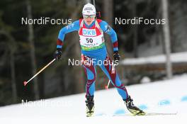 13.03.2009, Vancouver, Canada (CAN): Sylvie Becaert (FRA), Fischer, Rottefella, Exel, Odlo - IBU world cup biathlon, sprint women, Vancouver (CAN). www.nordicfocus.com. © Manzoni/NordicFocus. Every downloaded picture is fee-liable.