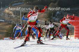 21.02.2009, Pyeong Chang, Korea (KOR): Emil Hegle Svendsen (NOR), Madshus, Rottefella, Swix, Odlo, Lars Berger (NOR), Madshus, Rottefella, Odlo - IBU world championships biathlon, mass men, Pyeong Chang (KOR). www.nordicfocus.com. © Manzoni/NordicFocus. Every downloaded picture is fee-liable.