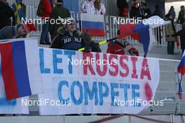 21.02.2009, Pyeong Chang, Korea (KOR): Russian fans with banner - IBU world championships biathlon, mass men, Pyeong Chang (KOR). www.nordicfocus.com. © Manzoni/NordicFocus. Every downloaded picture is fee-liable.