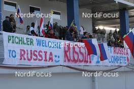 21.02.2009, Pyeong Chang, Korea (KOR): Russian Fans with banner - IBU world championships biathlon, mass men, Pyeong Chang (KOR). www.nordicfocus.com. © Manzoni/NordicFocus. Every downloaded picture is fee-liable.