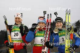 22.02.2009, Pyeong Chang, Korea (KOR): l-r:Anastasia Kuzmina (SVK), Exel , Olga Zaitseva (RUS), Madshus, Rottefella, adidas, Helena Jonsson (SWE), Fischer, Rottefella, Leki, adidas  - IBU world championships biathlon, medals, Pyeong Chang (KOR). www.nordicfocus.com. © Felgenhauer/NordicFocus. Every downloaded picture is fee-liable.