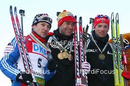 12.02.2009, Pyeong Chang, Korea (KOR): l-r: Maxim Tchoudov (RUS), Madshus, Rottefella, adidas, Ole Einar Bjoerndalen (NOR), Madshus, Rottefella, Odlo, Alexander Os (NOR), Fischer, Rottefella, Swix, Odlo - IBU world championships biathlon, medals, Pyeong Chang (KOR). www.nordicfocus.com. © Manzoni/NordicFocus. Every downloaded picture is fee-liable.