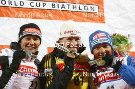 14.02.2009, Pyeong Chang, Korea (KOR): l-r: Simone Hauswald (GER), Fischer, Rottefella, Exel, adidas, Toko, Kati Wilhelm (GER), Madshus, Rottefella, Swix, adidas, Olga Zaitseva (RUS), Madshus, Rottefella, Swix, adidas - IBU world championships biathlon, medals, Pyeong Chang (KOR). www.nordicfocus.com. © Manzoni/NordicFocus. Every downloaded picture is fee-liable.