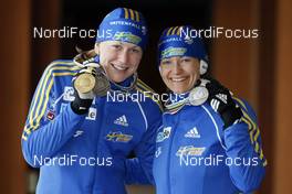 20.02.2009, Pyeong Chang, Korea (KOR): l-r:  Helena Jonsson (SWE), Fischer, Rottefella, Leki, adidas,Anna Carin Olofsson (SWE), Madshus, Rottefella, Leki, adidas  - IBU world championships biathlon, medals, Pyeong Chang (KOR). www.nordicfocus.com. © Felgenhauer/NordicFocus. Every downloaded picture is fee-liable.