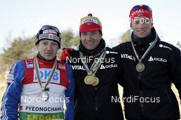 12.02.2009, Pyeong Chang, Korea (KOR): l-r: Maxim Tchoudov (RUS), Madshus, Rottefella, Swix/Exel, adidas, Ole Einar Bjoerndalen (NOR), Madshus, Rottefella, Odlo, Alexander Os (NOR), Fischer, Rottefella, Odlo  - IBU world championships biathlon, medals, Pyeong Chang (KOR). www.nordicfocus.com. © Felgenhauer/NordicFocus. Every downloaded picture is fee-liable.