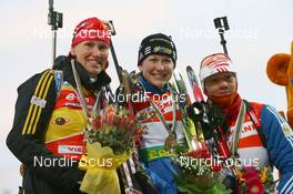 12.02.2009, Pyeong Chang, Korea (KOR): l-r: Kati Wilhelm (GER), Madshus, Rottefella, Swix, adidas, hj, Olga Zaitseva (RUS), Madshus, Rottefella, Swix, adidas - IBU world championships biathlon, medals, Pyeong Chang (KOR). www.nordicfocus.com. © Manzoni/NordicFocus. Every downloaded picture is fee-liable.