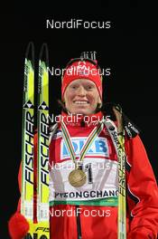 18.02.2009, Pyeong Chang, Korea (KOR): Tora Berger (NOR), Fischer, Rottefella, Odlo - IBU world championships biathlon, medals, Pyeong Chang (KOR). www.nordicfocus.com. © Manzoni/NordicFocus. Every downloaded picture is fee-liable.