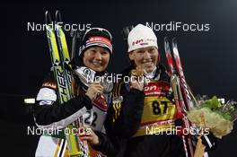 12.02.2009, Pyeong Chang, Korea (KOR): l-r: Simone Hauswald (GER), Fischer, Rottefella, Exel, adidas, Toko, Kati Wilhelm (GER), Madshus, Rottefella, Swix, adidas  - IBU world championships biathlon, medals, Pyeong Chang (KOR). www.nordicfocus.com. © Felgenhauer/NordicFocus. Every downloaded picture is fee-liable.