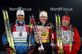 12.02.2009, Pyeong Chang, Korea (KOR): l-r:  Teja Gregorin (SLO), Fischer, Kati Wilhelm (GER), Madshus, Rottefella, Swix, adidas, Tora Berger (NOR), Fischer, Rottefella, Odlo  - IBU world championships biathlon, medals, Pyeong Chang (KOR). www.nordicfocus.com. © Felgenhauer/NordicFocus. Every downloaded picture is fee-liable.