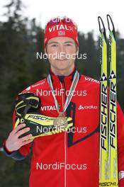 27.03.2009, Pyeong Chang, Korea (KOR): Alexander Os (NOR), Fischer, Rottefella, Swix, Odlo - IBU world championships biathlon, medals, Pyeong Chang (KOR). www.nordicfocus.com. © Manzoni/NordicFocus. Every downloaded picture is fee-liable.
