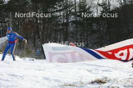 15.02.2009, Pyeong Chang, Korea (KOR): Strong winds destroyed the ads - IBU world championships biathlon, pursuit women, Pyeong Chang (KOR). www.nordicfocus.com. © Manzoni/NordicFocus. Every downloaded picture is fee-liable.