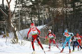 15.02.2009, Pyeong Chang, Korea (KOR): Solveig Rogstad (NOR), Rossignol, Rottefella, KV+, Odlo, Zina Kocher (CAN), Atomic, Leki, Odlo, Anna Lebedeva (KAZ), Madshus, Rottefella, Alpina, Swix - IBU world championships biathlon, pursuit women, Pyeong Chang (KOR). www.nordicfocus.com. © Manzoni/NordicFocus. Every downloaded picture is fee-liable.