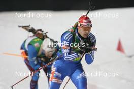 22.02.2009, Pyeong Chang, Korea (KOR): Evgeny Ustyugov (RUS), Madshus, Rottefella, Swix, adidas - IBU world championships biathlon, relay men, Pyeong Chang (KOR). www.nordicfocus.com. © Manzoni/NordicFocus. Every downloaded picture is fee-liable.