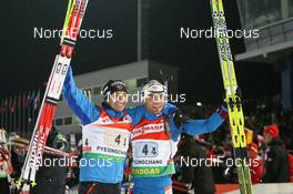 19.02.2009, Pyeong Chang, Korea (KOR): Vincent Defrasne (FRA), Atomic, Rottefella, One Way, Odlo, Simon Fourcade (FRA), Fischer, Rottefella, Swix, Odlo - IBU world championships biathlon, relay mixed, Pyeong Chang (KOR). www.nordicfocus.com. © Manzoni/NordicFocus. Every downloaded picture is fee-liable.