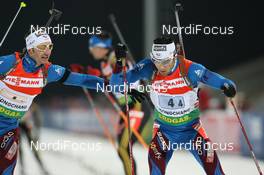 19.02.2009, Pyeong Chang, Korea (KOR): Vincent Defrasne (FRA), Atomic, Rottefella, One Way, Odlo, Simon Fourcade (FRA), Fischer, Rottefella, Swix, Odlo - IBU world championships biathlon, relay mixed, Pyeong Chang (KOR). www.nordicfocus.com. © Manzoni/NordicFocus. Every downloaded picture is fee-liable.