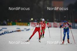 14.02.2009, Pyeong Chang, Korea (KOR): Selina Gasparin (SUI), Rossignol, Rottefella, Leki, adidas and Anna Carin Olofsson-Zidek (SWE), Madshus, Rottefella, Alpina, Leki, adidas - IBU world championships biathlon, sprint women, Pyeong Chang (KOR). www.nordicfocus.com. © Manzoni/NordicFocus. Every downloaded picture is fee-liable.