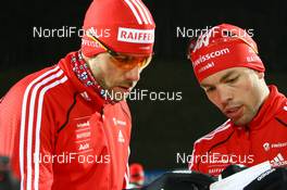 10.02.2009, Pyeong Chang, Korea (KOR): Simon Hallenbarter (SUI), Madshus, Rottefella, KV+, adidas and Claudio Boeckli (SUI), Rossignol, Rottefella, Leki, adidas - IBU world championships biathlon, training, Pyeong Chang (KOR). www.nordicfocus.com. © Manzoni/NordicFocus. Every downloaded picture is fee-liable.