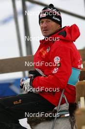 10.02.2009, Pyeong Chang, Korea (KOR): Alfred Eder (AUT), headcoach Team Austria with his special chair - IBU world championships biathlon, training, Pyeong Chang (KOR). www.nordicfocus.com. © Manzoni/NordicFocus. Every downloaded picture is fee-liable.