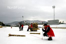 09.02.2009, Pyeong Chang, Korea (KOR): WCH Feature - Volunteers building the warm up area - IBU world championships biathlon, training, Pyeong Chang (KOR). www.nordicfocus.com. © Manzoni/NordicFocus. Every downloaded picture is fee-liable.
