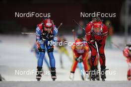 06.12.2009, Oestersund, Sweden (SWE): Svetlana Sleptsova (RUS), Madshus, Rottefella, Swix, adidas leads Anne Ingstadbjoerg (NOR), Madshus, Rottefella, Odlo - IBU world cup biathlon, relay women, Oestersund (SWE). www.nordicfocus.com. © Manzoni/NordicFocus. Every downloaded picture is fee-liable.