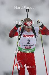 11.12.2009, Hochfilzen, Austria (AUT): Daniel Mesotitsch (AUT), Fischer, Rottefella, Leki - IBU world cup biathlon, sprint men, Hochfilzen (AUT). www.nordicfocus.com. © Manzoni/NordicFocus. Every downloaded picture is fee-liable.