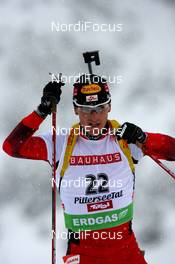 11.12.2009, Hochfilzen, Austria (AUT): Friedrich Pinter (AUT), Atomic, Swix - IBU world cup biathlon, sprint men, Hochfilzen (AUT). www.nordicfocus.com. © Manzoni/NordicFocus. Every downloaded picture is fee-liable.