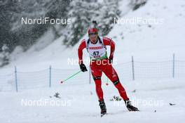 11.12.2009, Hochfilzen, Austria (AUT): Simon Hallenbarter (SUI), Madshus, Rottefella, KV+, adidas - IBU world cup biathlon, sprint men, Hochfilzen (AUT). www.nordicfocus.com. © Manzoni/NordicFocus. Every downloaded picture is fee-liable.