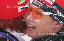 19.12.2009, Pokljuka, Slovenia (SLO): l-r: Kati Wilhelm (GER), Madshus, Rottefella, Swix, adidas, Magdalena Neuner (GER), Fischer, Rottefella, Exel, adidas  - IBU world cup biathlon, sprint women, Pokljuka (SLO). www.nordicfocus.com. © Domanski/NordicFocus. Every downloaded picture is fee-liable.
