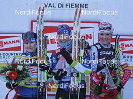 04.01.2009, Val di Fiemme, Italy (ITA): Podium TdS overall, l-r: Aino Kaisa Saarinen (FIN), Rossignol, Rottefella, One Way, Virpi Kuitunen (FIN), Rossignol, Rottefella, One Way, Petra Majdic (SLO), Fischer, Rottefella, Alpina, One Way  - FIS world cup cross-country, tour de ski, final climb women, Val di Fiemme (ITA). www.nordicfocus.com. © Hemmersbach/NordicFocus. Every downloaded picture is fee-liable.
