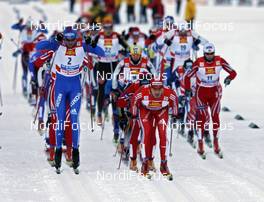 03.01.2009, Val di Fiemme, Italy (ITA): l-r:  Vasili Rotchev (RUS), Fischer, Salomon, Swix, adidas, Dario Cologna (SUI), Fischer, Rottefella, Alpina, Swix, adidas, - FIS world cup cross-country, tour de ski, mass men, Val di Fiemme (ITA). www.nordicfocus.com. © Felgenhauer/NordicFocus. Every downloaded picture is fee-liable.