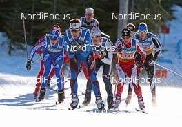 18.01.2009, Vancouver, Canada (CAN): group, in front Cyril Miranda (FRA), Fischer, Salomon, Odlo, behind Ivan Ivanov (RUS), Fischer, Salomon, adidas and Fabio Pasini (ITA), Fischer, Salomon, Swix, Salice, topshot - FIS world cup cross-country, team sprint men, Vancouver (CAN). www.nordicfocus.com. © Hemmersbach/NordicFocus. Every downloaded picture is fee-liable.