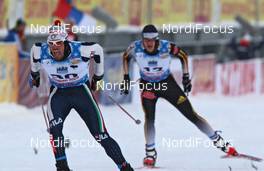 31.01.2009, Rybisnk, Russia (RUS): group, in front Renato Pasini (ITA), Fischer, Salomon, One Way, Salice, behind Franz Goering (GER), Atomic, adidas, Toko  - FIS world cup cross-country, individual sprint, Rybinsk (RUS). www.nordicfocus.com. © Hemmersbach/NordicFocus. Every downloaded picture is fee-liable.