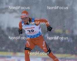 30.01.2009, Rybisnk, Russia (RUS): Reto Burgermeister (SUI), Fischer, Salomon, Swix, adidas  - FIS world cup cross-country, mass men, Rybinsk (RUS). www.nordicfocus.com. © Hemmersbach/NordicFocus. Every downloaded picture is fee-liable.
