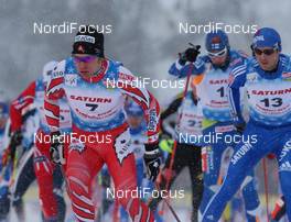 30.01.2009, Rybisnk, Russia (RUS): group, in front Devon Kershaw (CAN), Fischer, Salomon, Swix, behind Vasili Rotchev (RUS), Fischer, Salomon, Swix, adidas  - FIS world cup cross-country, mass men, Rybinsk (RUS). www.nordicfocus.com. © Hemmersbach/NordicFocus. Every downloaded picture is fee-liable.