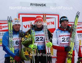 30.01.2009, Rybisnk, Russia (RUS): podium, l-r Jean Marc Gaillard (FRA), Fischer, Rottefella, Swix, Odlo, Tobias Angerer (GER), Rossignol, Rottefella, One Way, adidas, Sergei Dolidovich (BLR), Fischer, Rottefella, Komperdell  - FIS world cup cross-country, mass men, Rybinsk (RUS). www.nordicfocus.com. © Hemmersbach/NordicFocus. Every downloaded picture is fee-liable.