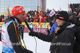 30.01.2009, Rybisnk, Russia (RUS): Tobias Angerer (GER), Rossignol, Rottefella, One Way, adidas, interview Sandra Spitz (GER) FIS press coordinator xc, feature - FIS world cup cross-country, mass men, Rybinsk (RUS). www.nordicfocus.com. © Hemmersbach/NordicFocus. Every downloaded picture is fee-liable.