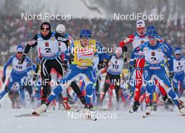 30.01.2009, Rybisnk, Russia (RUS): group, in front, l-r Aino Kaisa Saarinen (FIN), Rossignol, Rottefella, One Way and Virpi Kuitunen (FIN), Rossignol, Rottefella, One Way, behind left Justyna Kowalczyk (POL), Fischer, Salomon, Swix  - FIS world cup cross-country, mass women, Rybinsk (RUS). www.nordicfocus.com. © Hemmersbach/NordicFocus. Every downloaded picture is fee-liable.